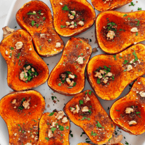 Moroccan-spiced honeynut squash on a serving platter.