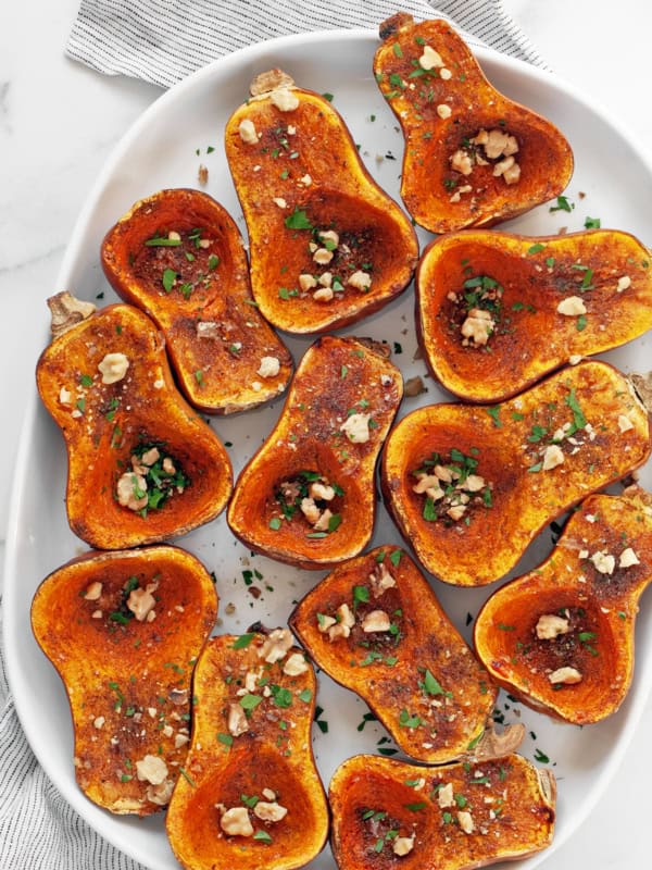 Moroccan-spiced honeynut squash on a serving platter.