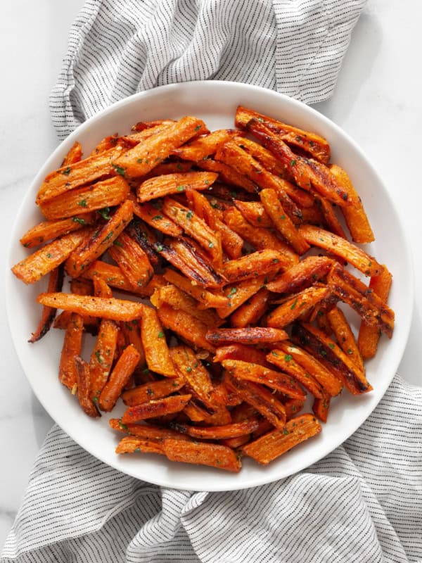 Parmesan roasted carrots on a plate.