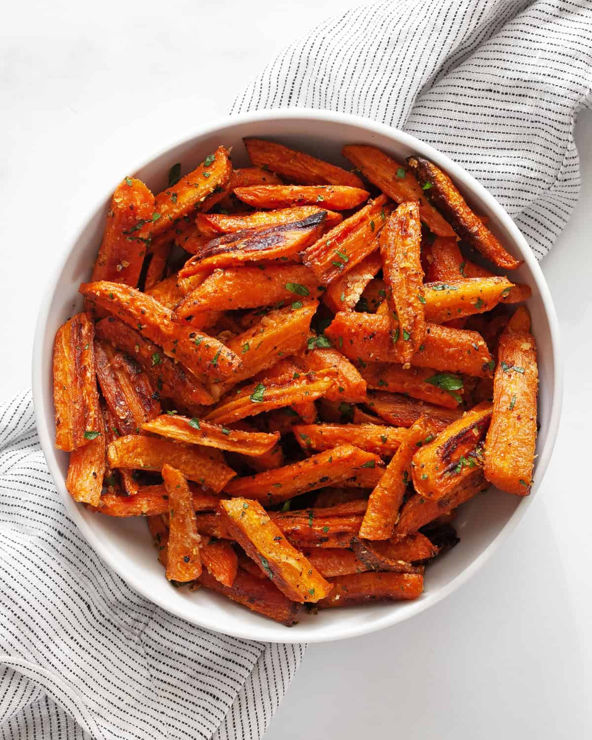 Parmesan garlic roasted carrots in a bowl.