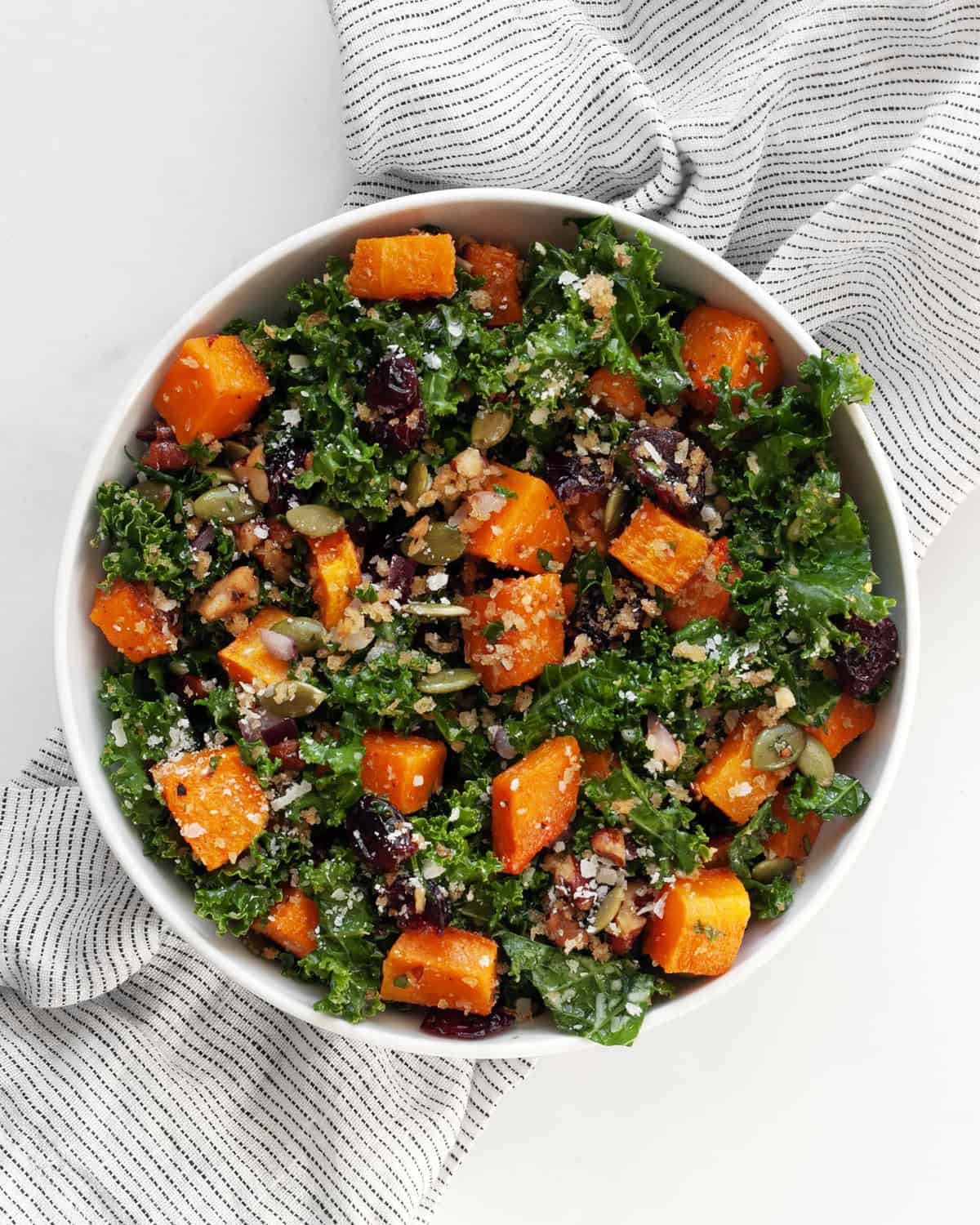 Butternut squash salad in a bowl.