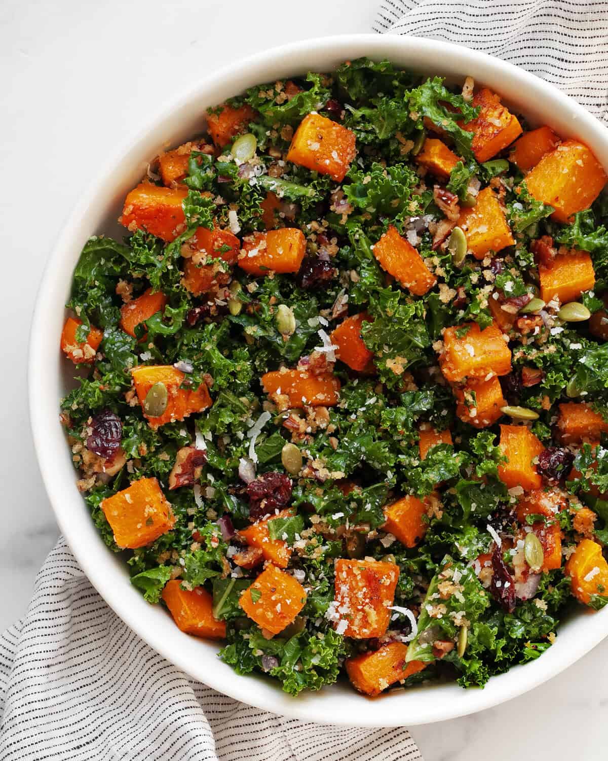 Roasted butternut squash salad in a large bowl.