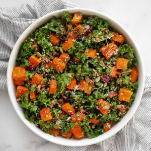 Squash kale salad in a bowl.