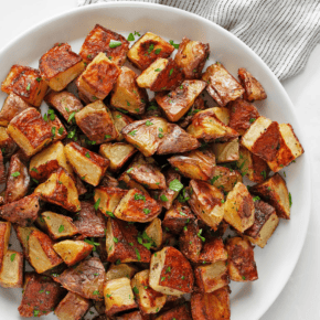 Roasted yukon gold potatoes on a plate.