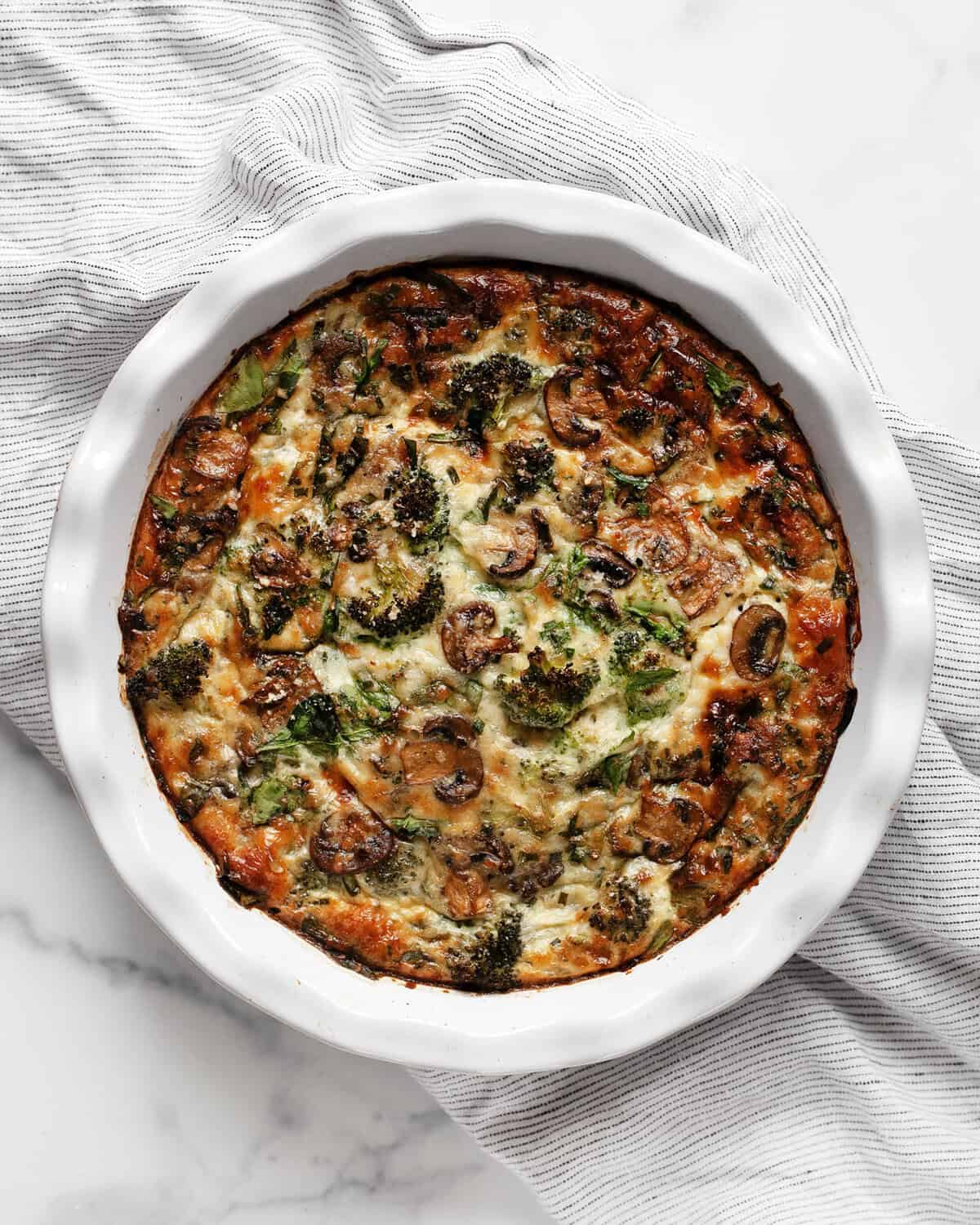 Veggie egg bake in a pie dish. 