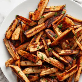 Roasted parsnips on a plate.