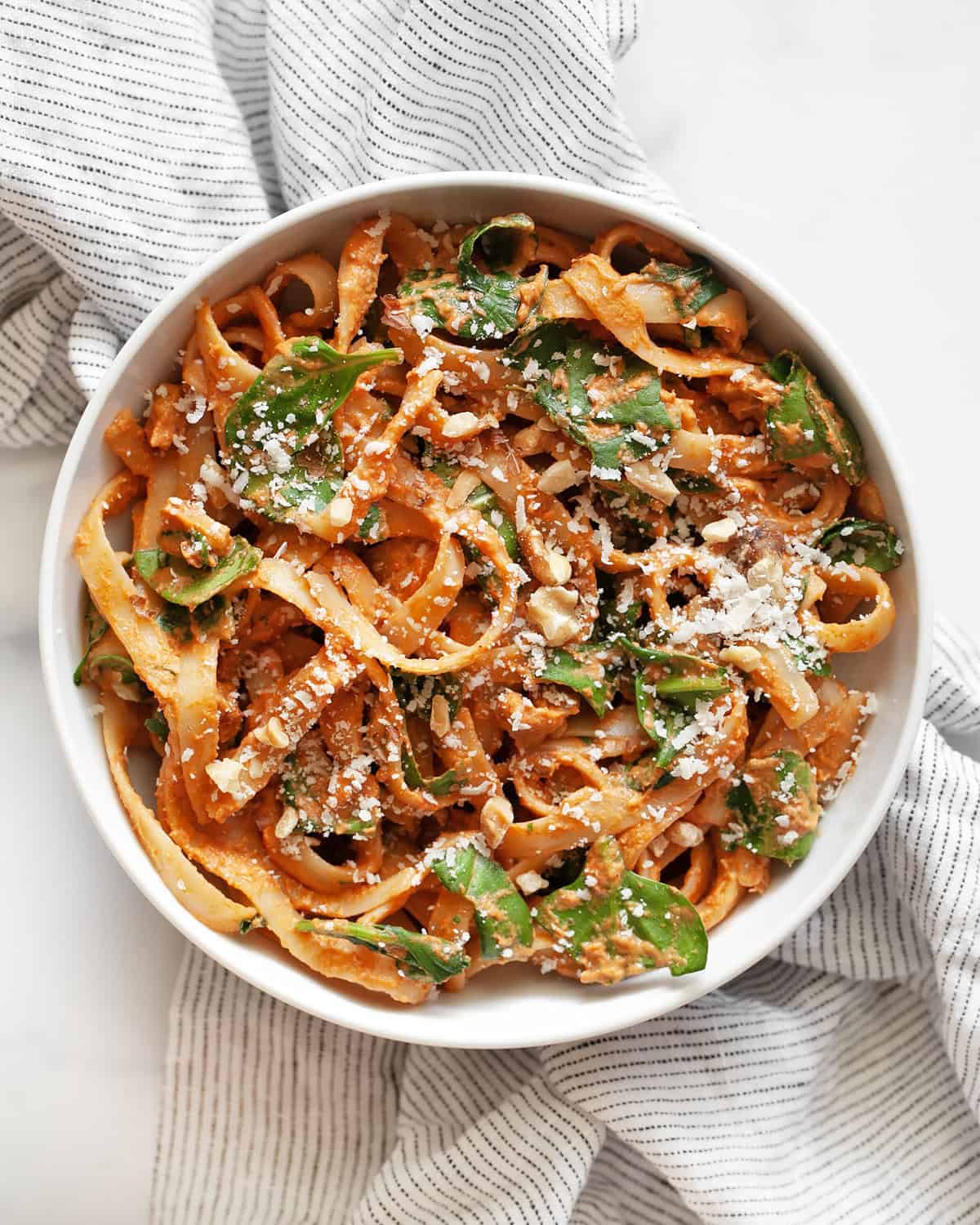 Creamy sun dried tomato pasta in a bowl.