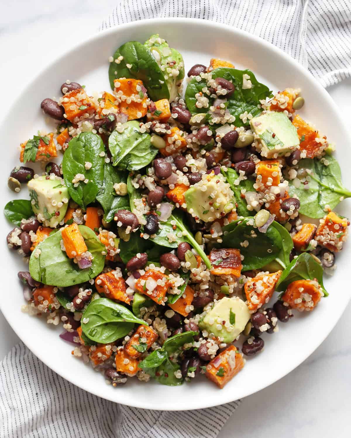 Roasted sweet potato black bean salad on a plate.