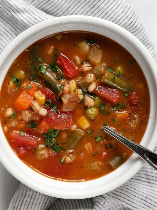 Bowl of vegetable barley soup.