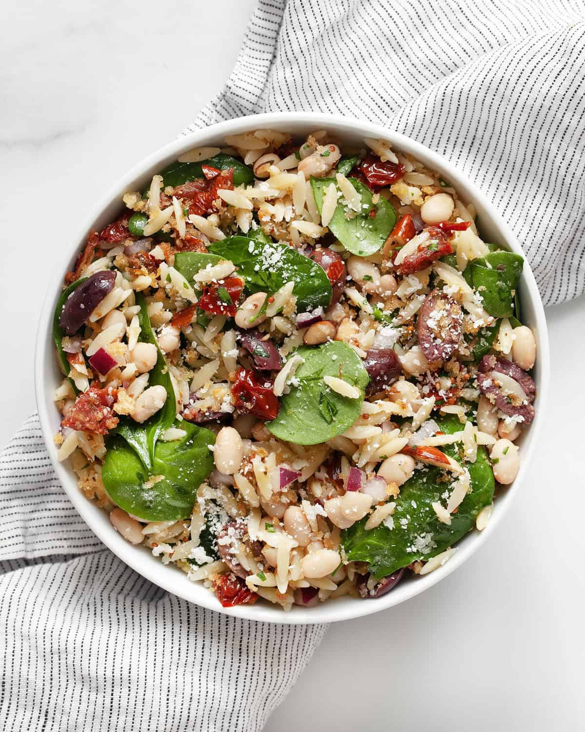 Lemon orzo salad in a bowl.